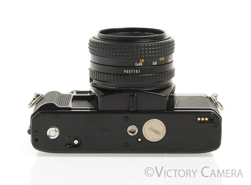 Minolta X-7A Black 35mm Film Camera w/ 50mm f1.7 Prime Lens -New Seals [Good]