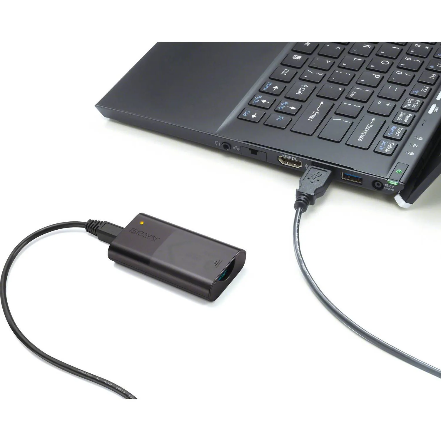 Sony Battery and Travel DC Charger Kit  with NP-BX1 Battery